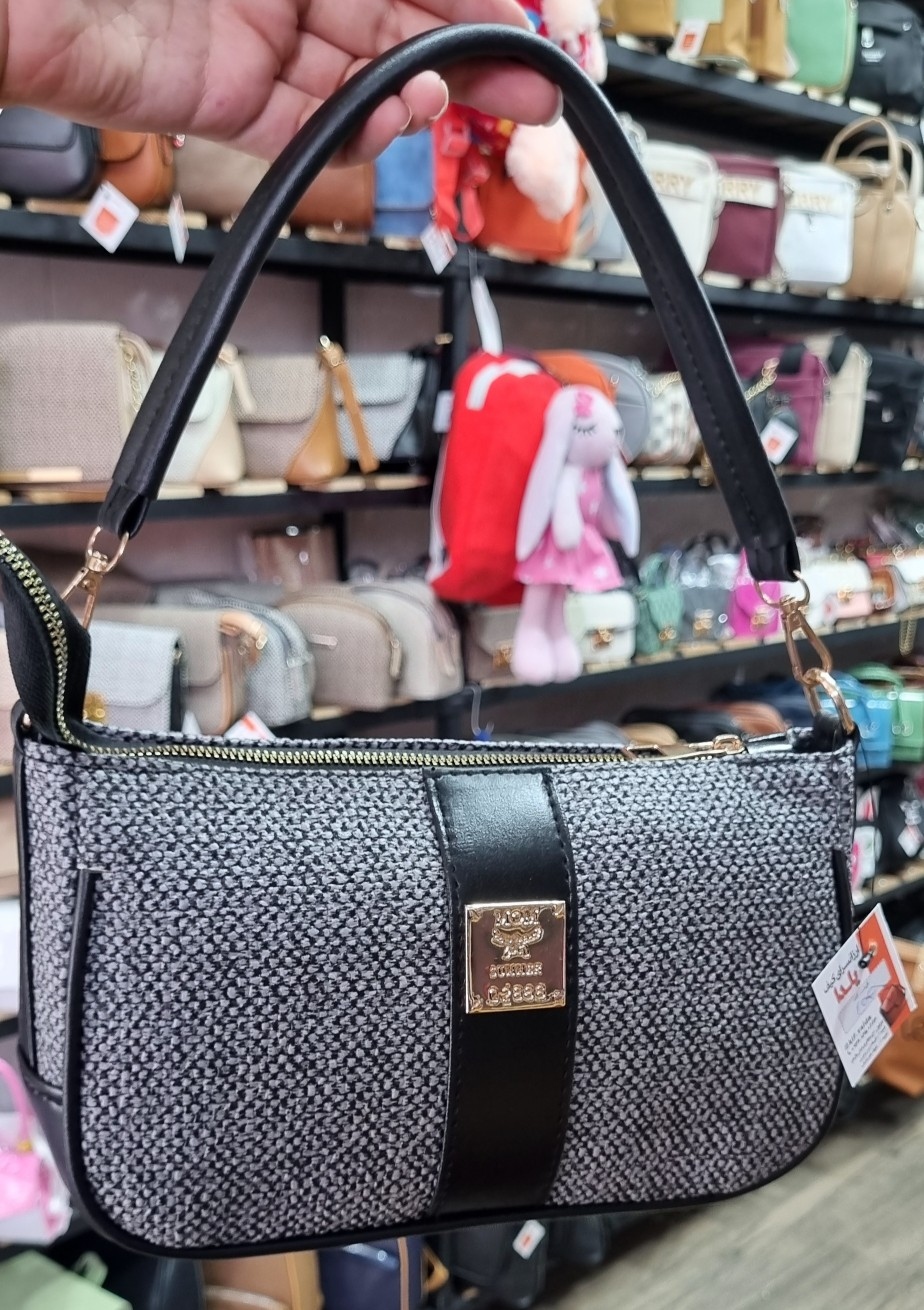 کیف زنانه چرم طرح کنفی